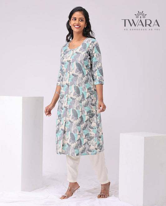 Twara cream leaf printed round neck, knee lenght, 3/4 th sleeve , a line kurti