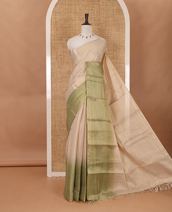 Borderless sandal-light green plain ombre-colored tissue saree, plain pallu & circle motifs printed blouse