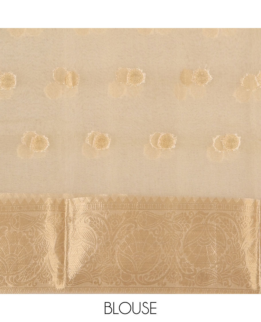 Cream semi-organza saree with zari buttas, zari border of temple & floral creeper designs, zari design pallu & running blouse