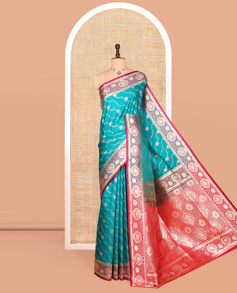Green Banarasi Nylon Saree, Decked up with Buttas, Contrast Floral Creeper Zari Border, Intricate Pallu, and a Contrast Blouse