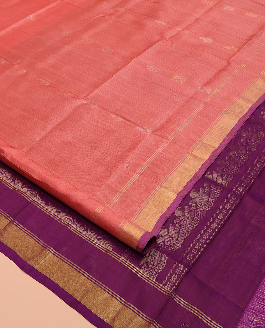 Peach Uppada Silk Saree, Enthralled with Zari Buttas on Its Body, Subtly Sparkled Zari Border, Complemented by a Contrast Pallu Depicting Intricate Design Weave, and Paired with a Contrast Blouse