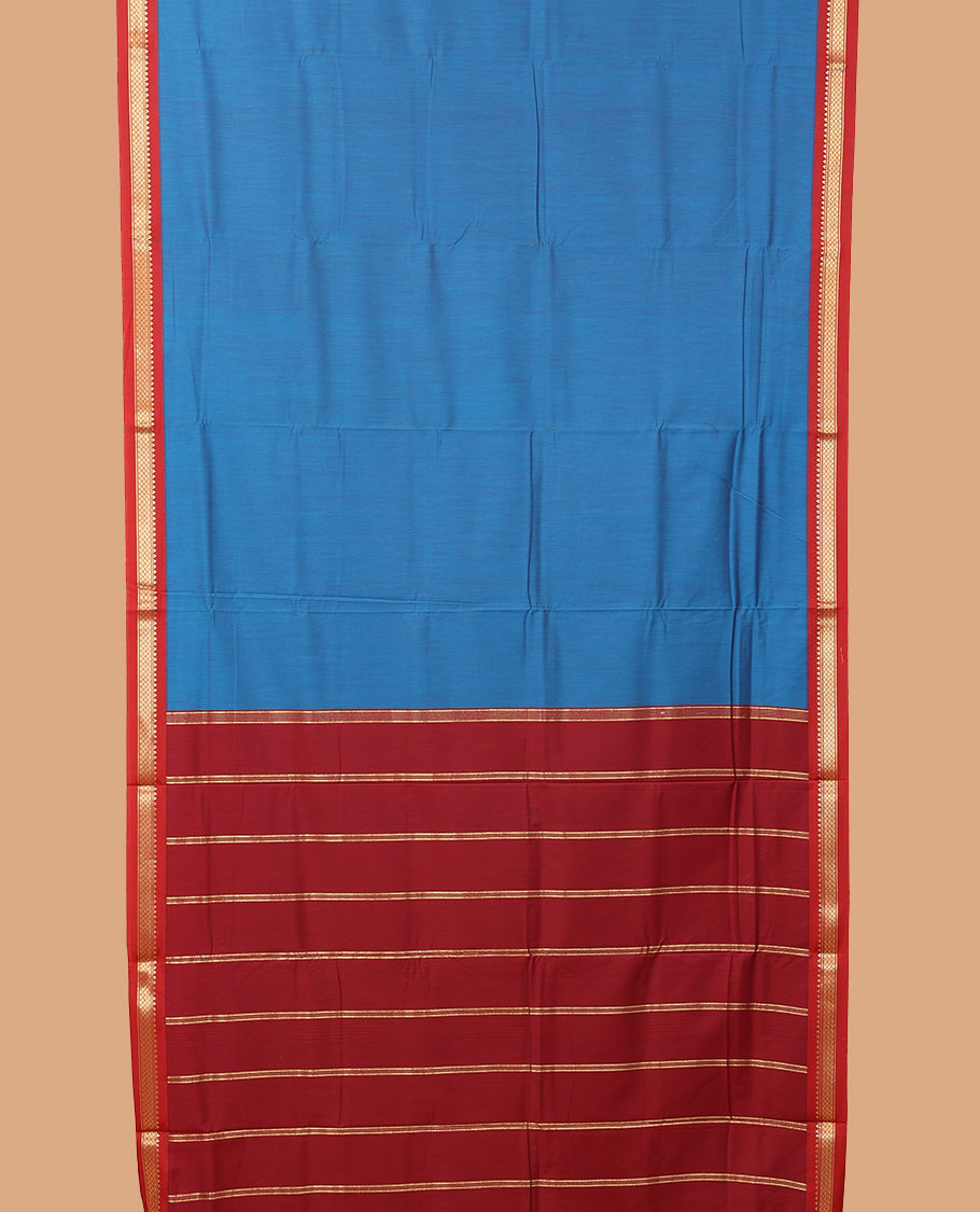 Blue plain nine-yard cotton saree, contrast temple traditional zari border, and striped pallu