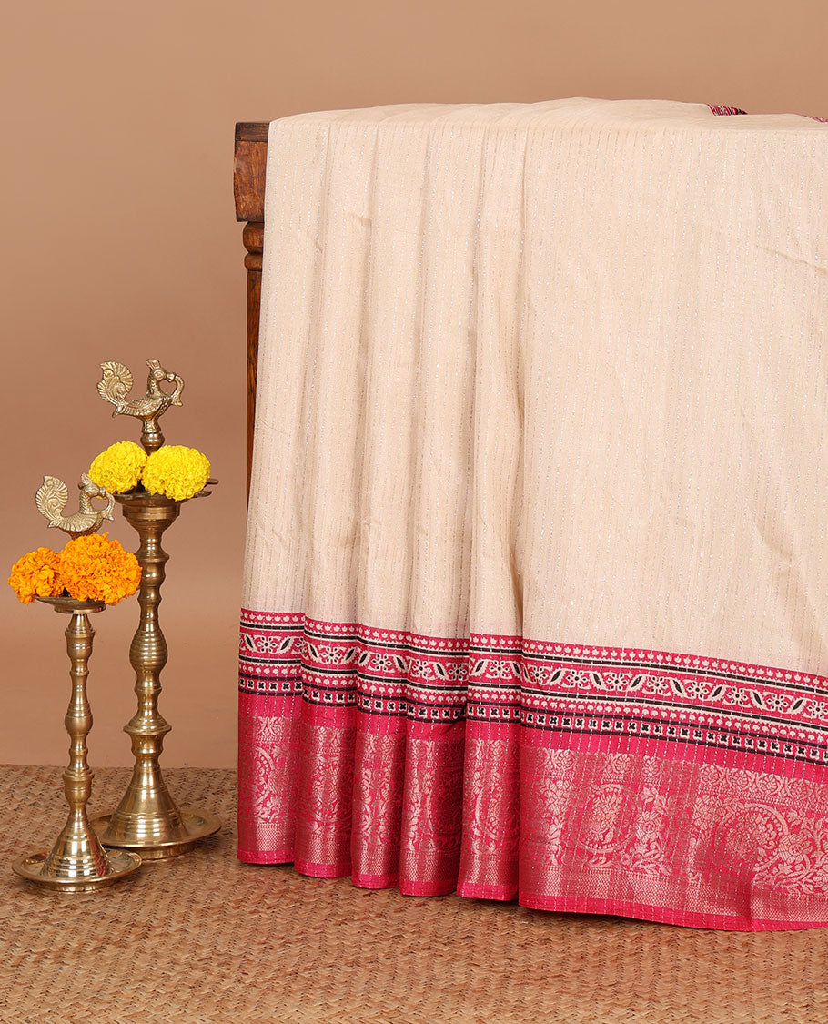 Cream vertical zari striped dola silk saree, contrast rani pink traditional zari border & intricate Ajrakh printed pallu