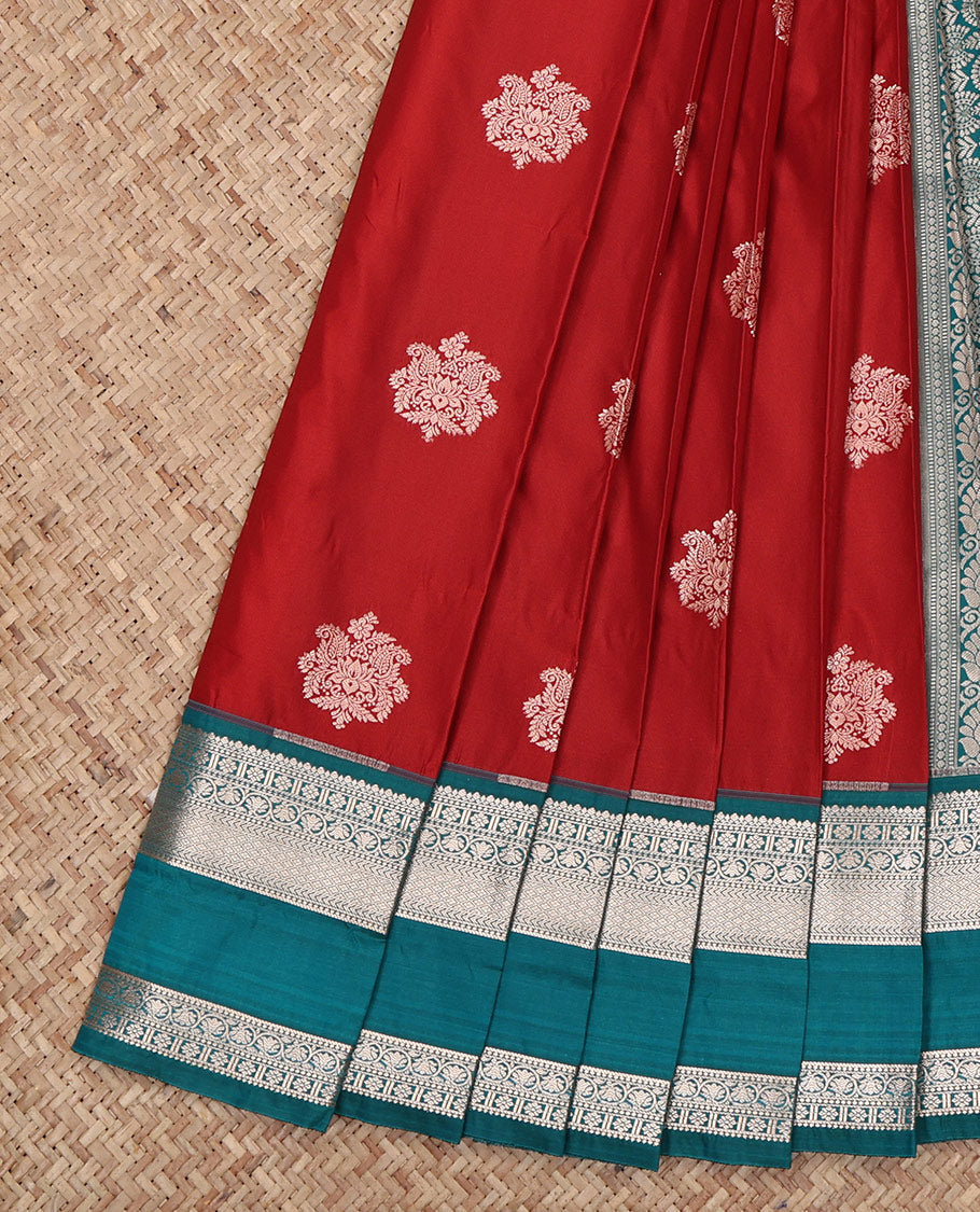 Crimson Red Budget Silk Saree, Richly Detailed with Zari Buttas All Over Its Body, Complemented by a Contrast Traditional Zari Design Rettai Pettu Border, Intricate Pallu, and Paired with a Contrast Blouse
