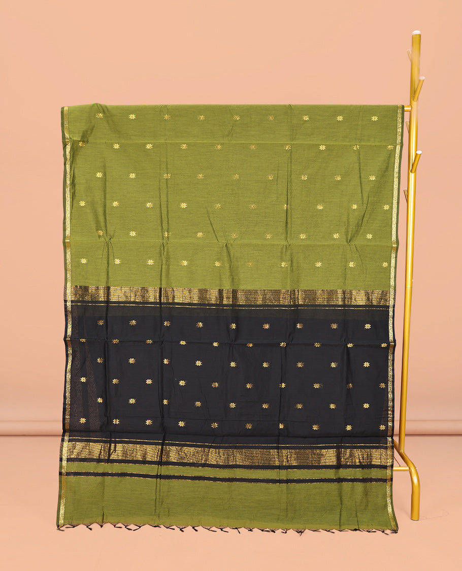 Green Maheshwari Cotton Saree, Beautified with Buttas All Over Its Body, Subtle Zari Piping Border, Complemented by a Contrast Pallu Steeped with Buttas, and Paired with a Contrast Blouse