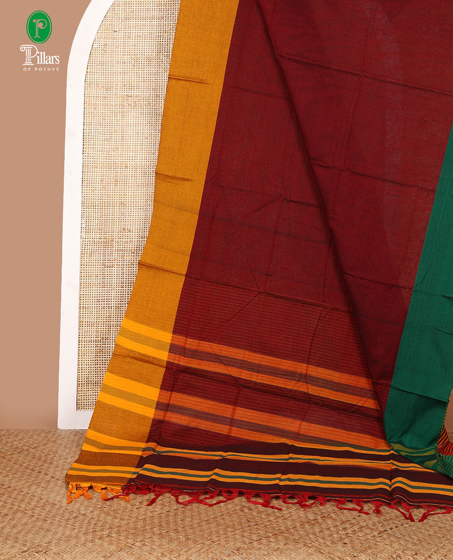 Maroon mercerised cotton saree with ganga jamuna border & cheer pallu along with striped blouse