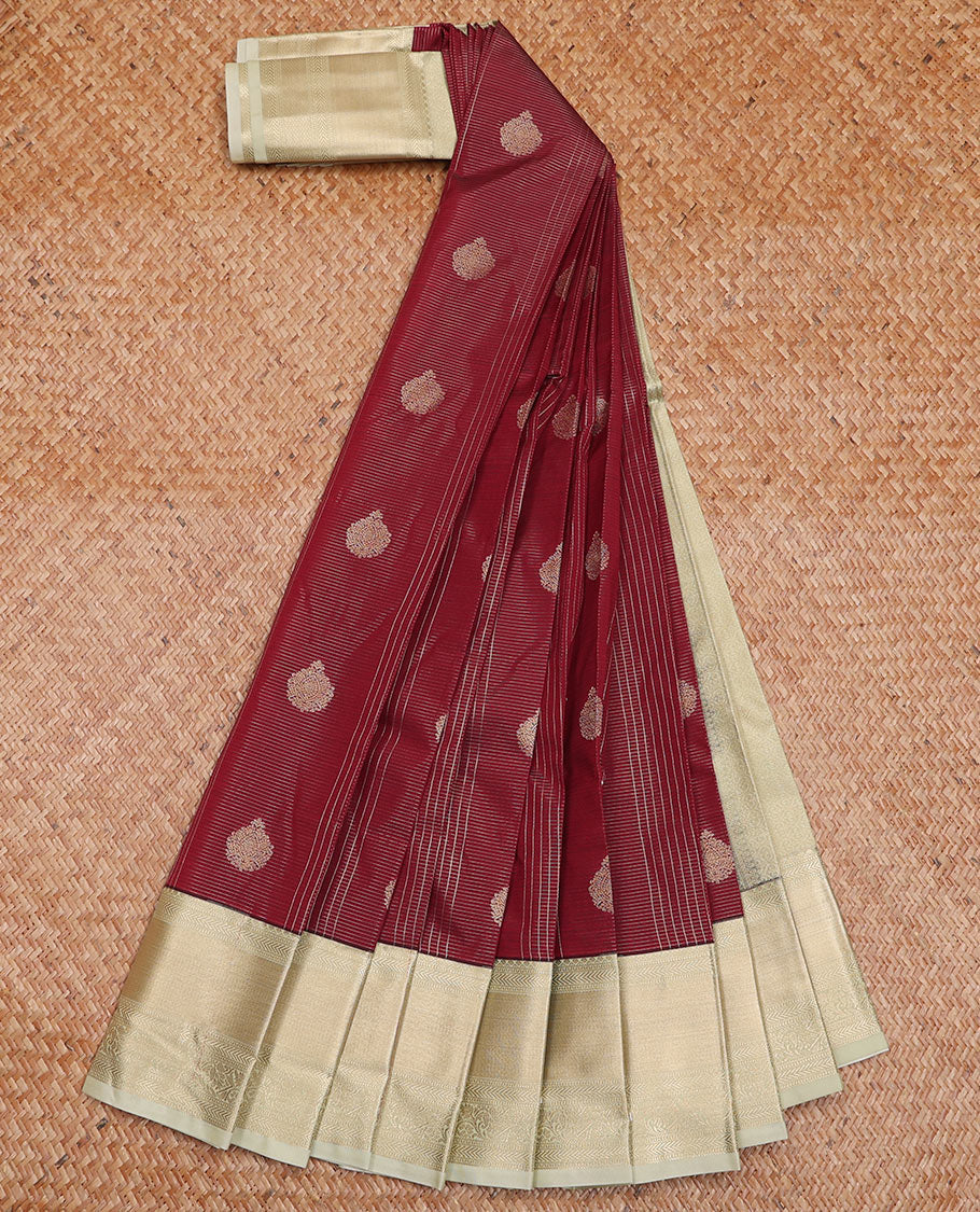 Maroon Budget Silk Saree Detailed with Zari Buttas and stripes, Complemented by a Contrast Traditional Zari Border, subtly decked up Pallu, and Paired with a Contrast Blouse