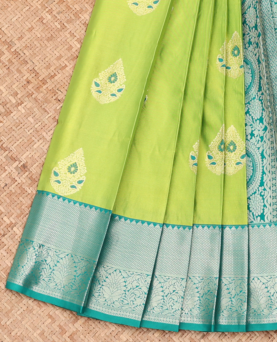 Green Budget Silk Saree, Opulently Embellished with Zari Meena Buttas All Over Its Body, Complemented by Contrast Traditional Zari Designs Woven Border, Intricately Designed Pallu and Paired with a Contrast Blouse