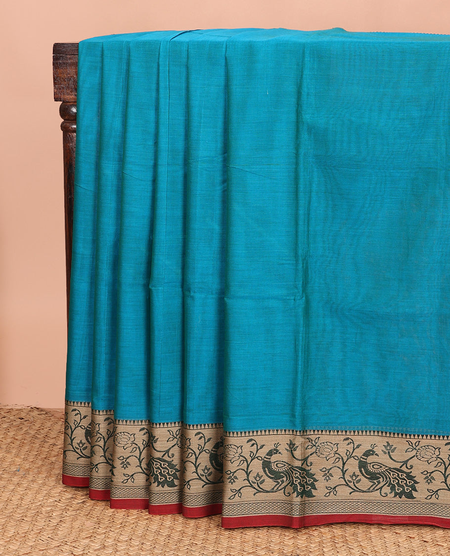 Blue plain Narayanapet cotton saree, contrast temple border of peacock motifs, and striped pallu