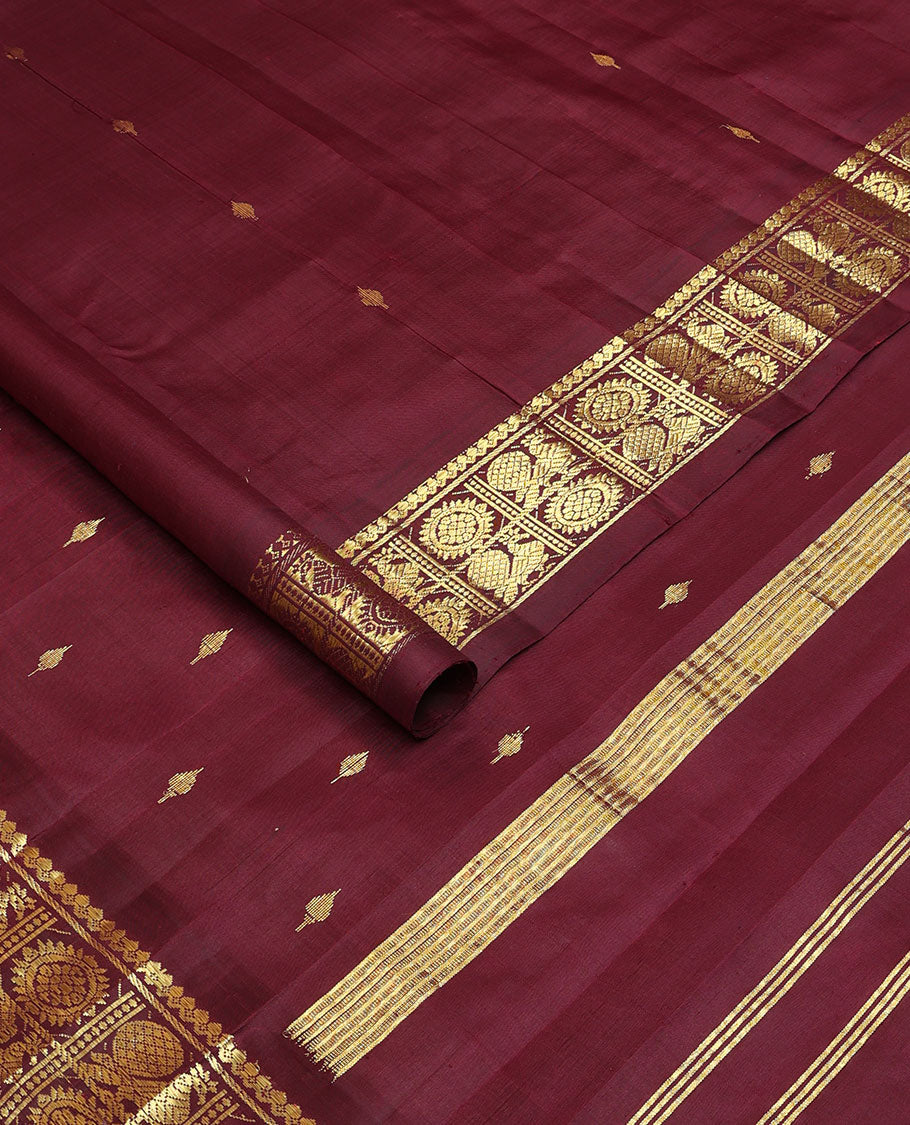 Maroon zari buttas Kanchipuram silksaree, one-sided border of salngai,banaras & annam chakram & zari design pallu