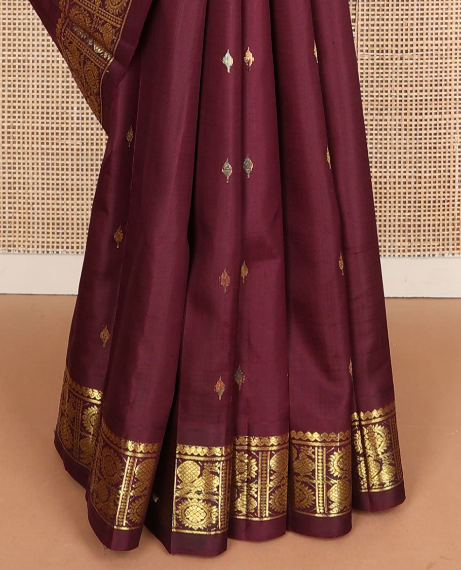Maroon zari buttas Kanchipuram silksaree, one-sided border of salngai,banaras & annam chakram & zari design pallu