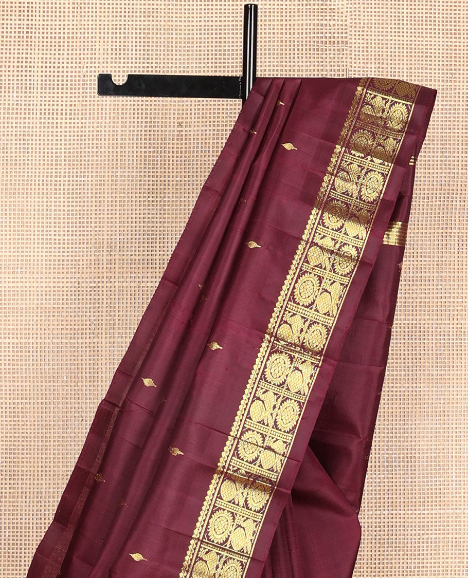 Maroon zari buttas Kanchipuram silksaree, one-sided border of salngai,banaras & annam chakram & zari design pallu