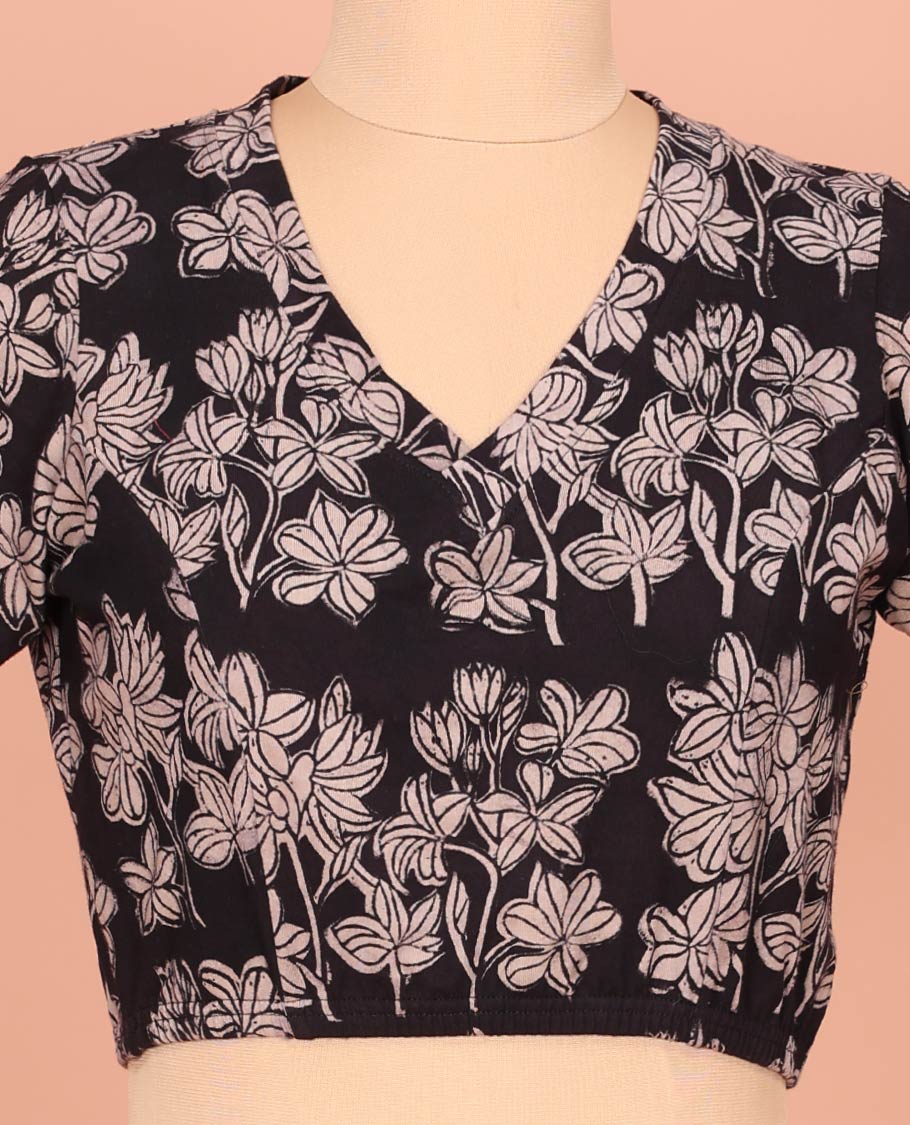 Black Cotton Readymade Blouse Subtly Sparked with All-Over Floral Print, Featuring a Front Leaf-Neck, a Closed Back Neck, and Elbow Sleeves