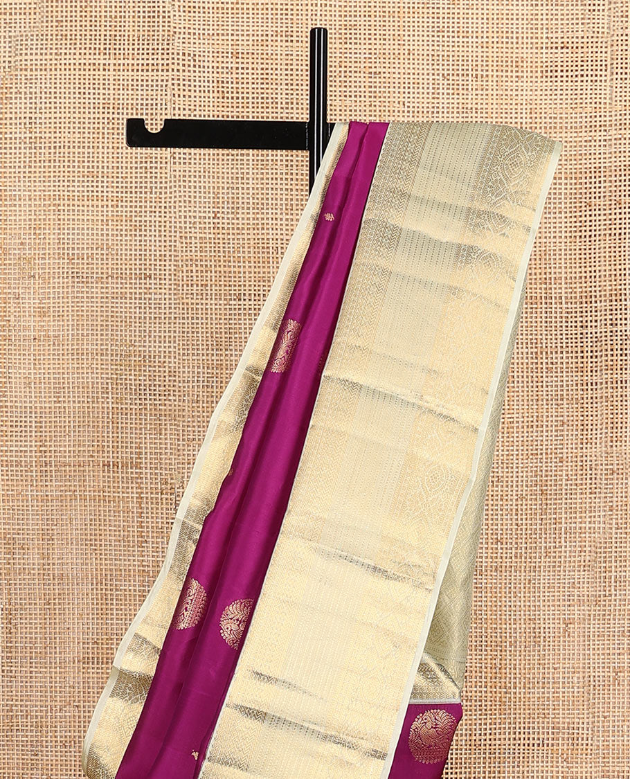 Purple round mayil buttas Vasundhara silk mix saree, contrast border of thilakam mokku, paisa, banaras, diamond, vanki, banaras, muthu, and chakra designs, and jaal pallu