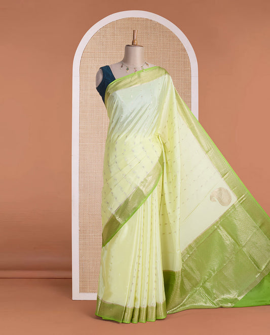 Green zari buttas & corner paisley buttas Mysore silk saree,contrast traditional zari border & paisley butta enclosed checked pallu