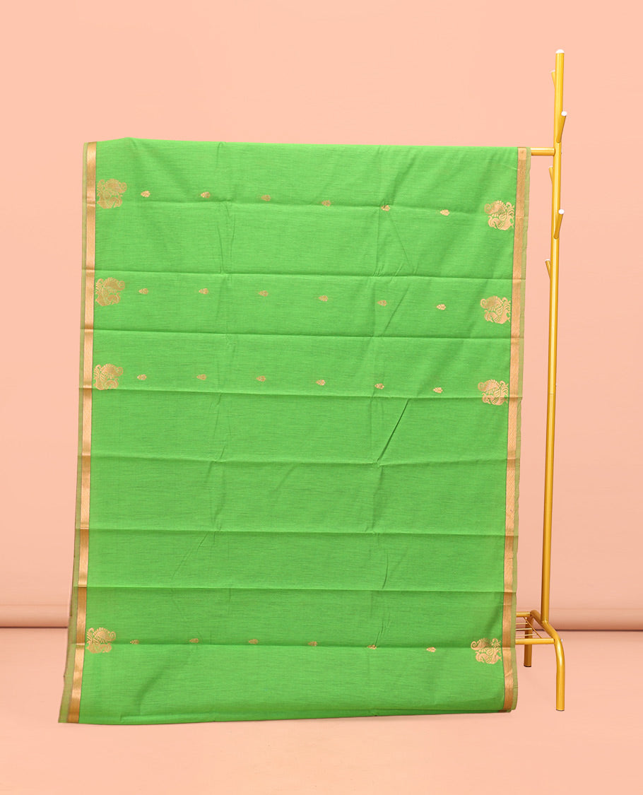 Parrot Green Semi-Silk Cotton Saree, Elegantly Framed with Zari Buttas All Over Its Body, a Subtle Zari Piping Border, Complemented by Contrast Pallu of Peacock Butta Enclosed Checked Design, and Paired with a Contrast Blouse