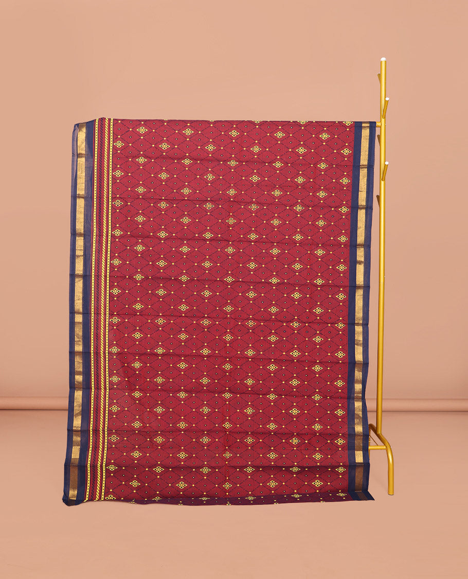 Red Chirala Cotton Saree, Accentuated with an Argyle Design, a Contrast Zari Border, Contrast Peacock Pallu, and a Contrast Blouse