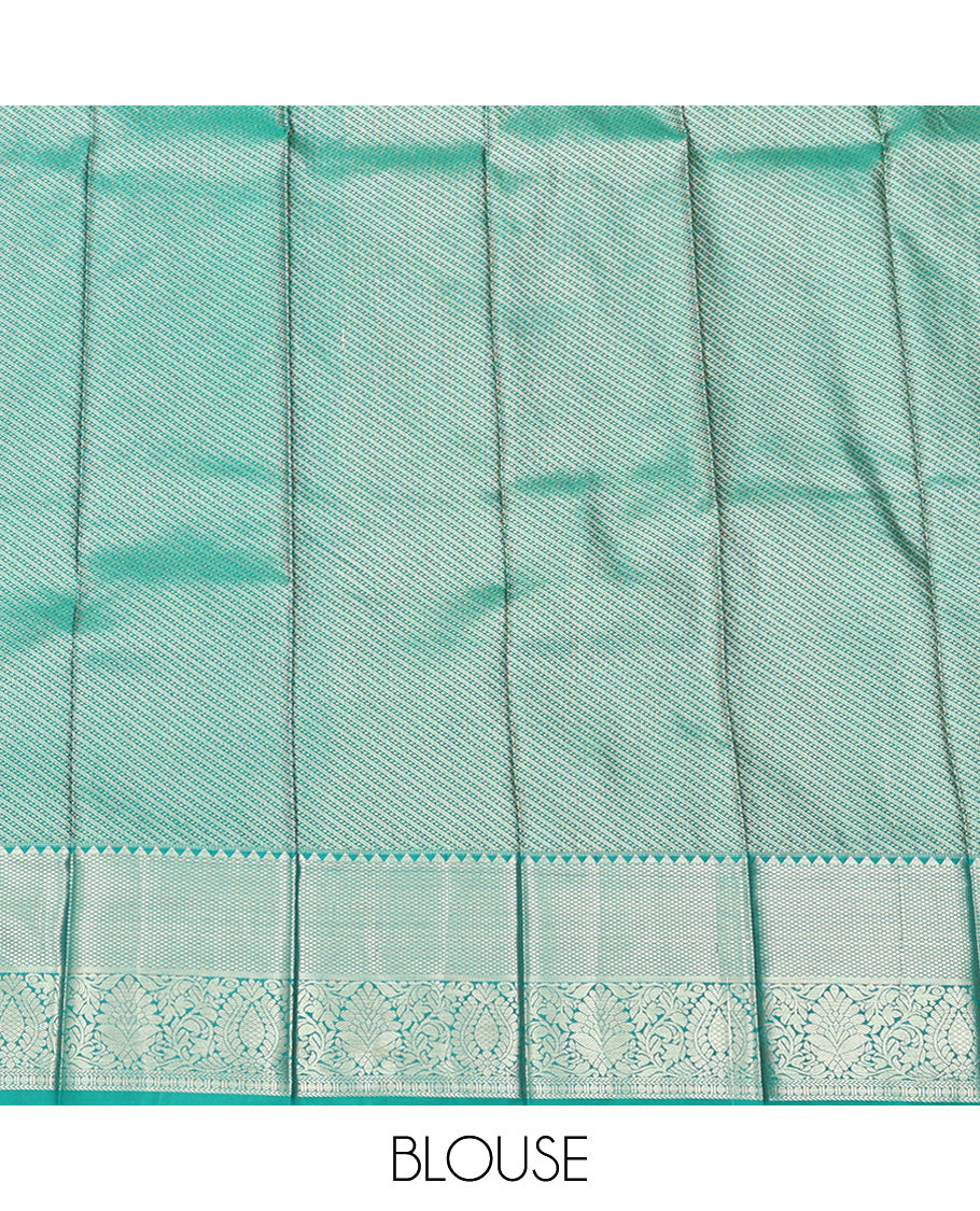 Green Budget Silk Saree, Opulently Embellished with Zari Meena Buttas All Over Its Body, Complemented by Contrast Traditional Zari Designs Woven Border, Intricately Designed Pallu and Paired with a Contrast Blouse