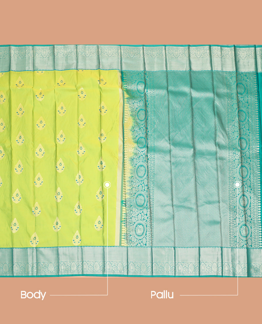 Green Budget Silk Saree, Opulently Embellished with Zari Meena Buttas All Over Its Body, Complemented by Contrast Traditional Zari Designs Woven Border, Intricately Designed Pallu and Paired with a Contrast Blouse