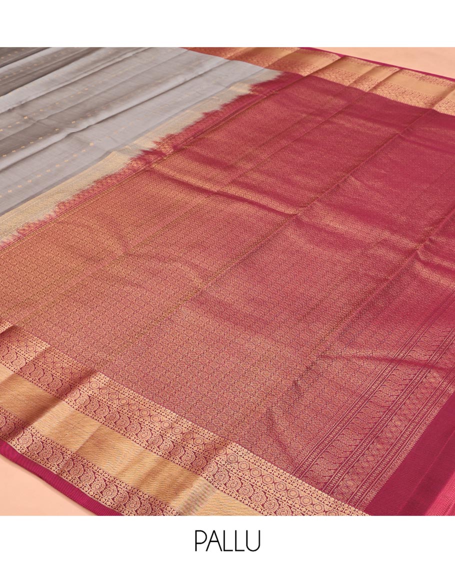 Grey Vasundhara Lite Silk Mix Saree, Subtly Sparkled With Zari Buttas All Over Its Body, Complemented by Contrast Border of Chakram and Manga Designs, Intricately Designed Pallu and Paired with a Contrast Blouse