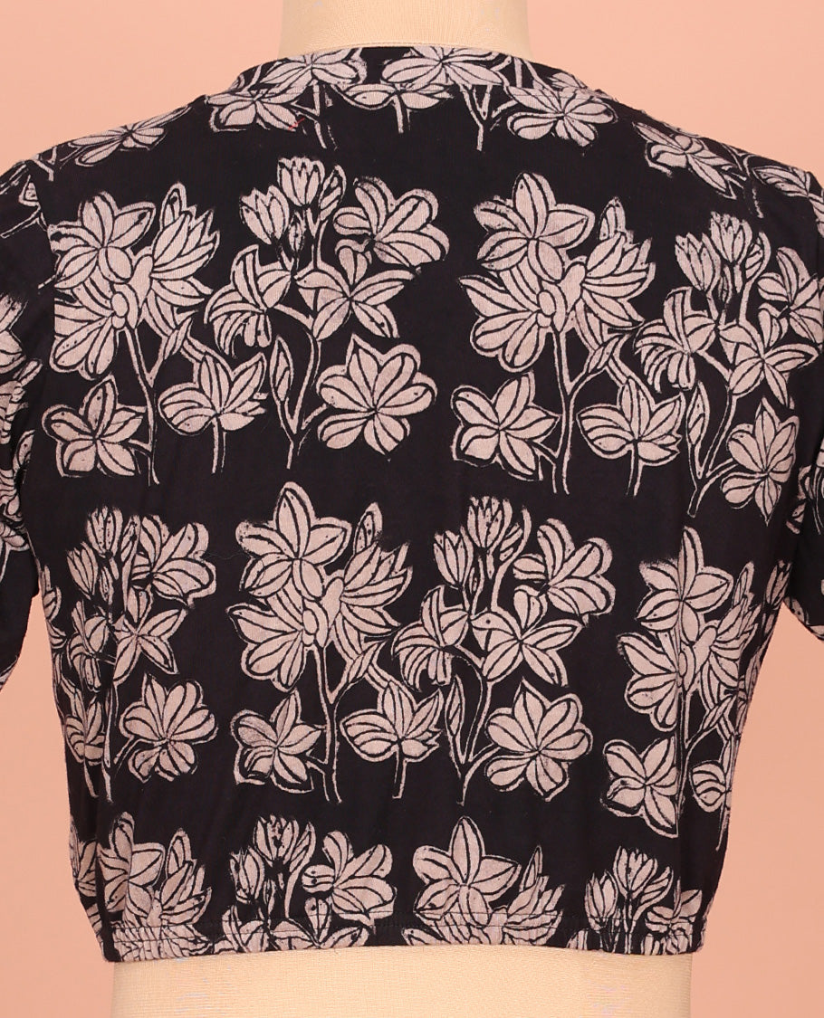 Black Cotton Readymade Blouse Subtly Sparked with All-Over Floral Print, Featuring a Front Leaf-Neck, a Closed Back Neck, and Elbow Sleeves