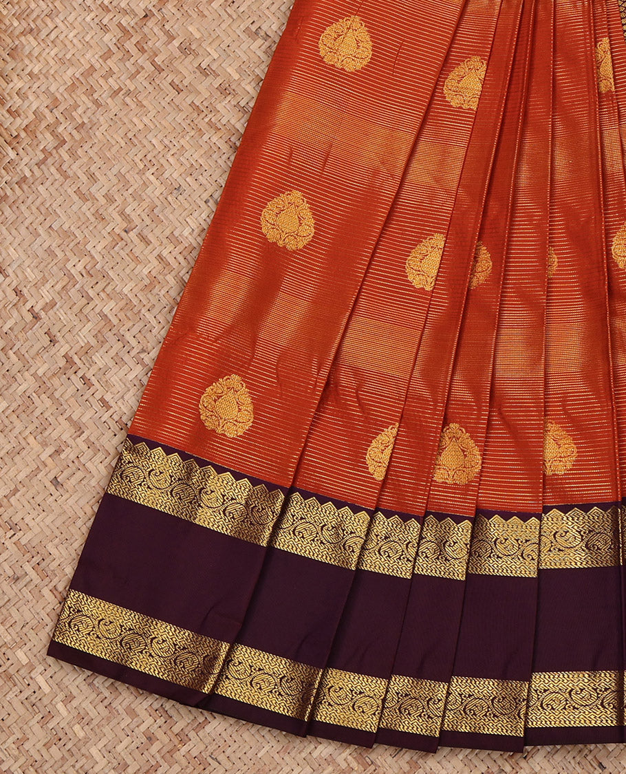 Rust Budget Silk Saree, Bedecked with Zari Buttas and Stripes, Complemented by Contrast Traditional Rettai Pettu Border, Grand Pallu and a Contrast Blouse