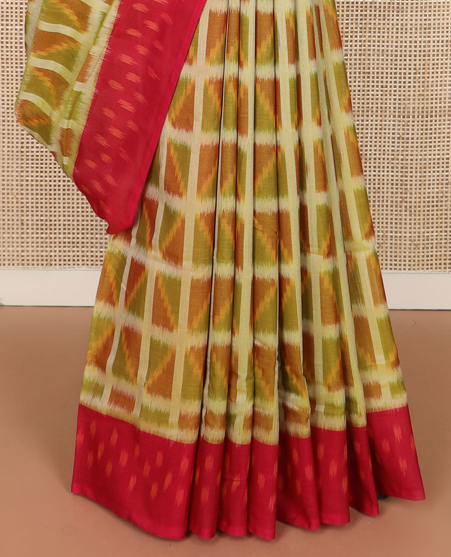 Green geometric-patterned Pochampally cotton saree, contrast ikkat border & pallu of ikkat zig-zag stripes & triangles
