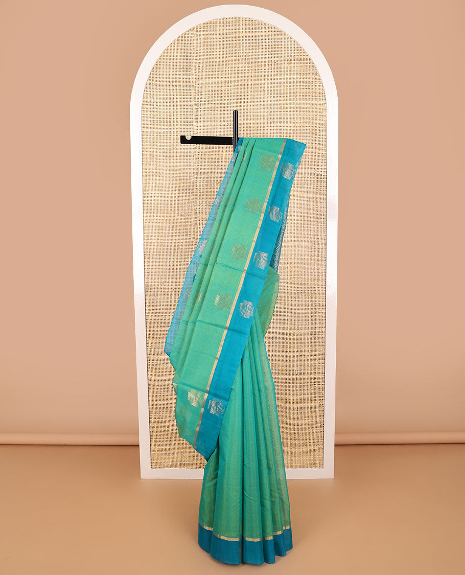 Sea green geometric design silk cotton saree with contrast zari design border & ogee design pallu