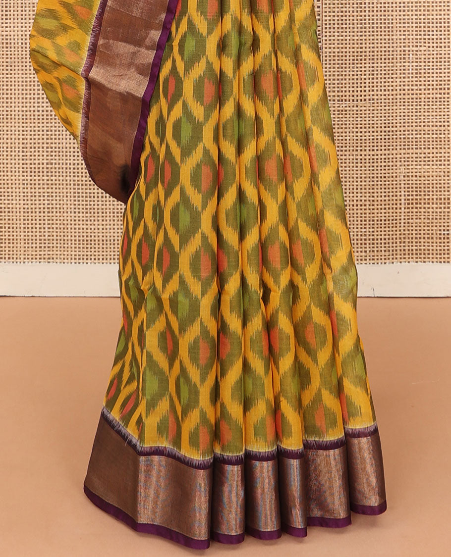 Yellow ikkat ogee patterned silk cotton saree, contrast zari bavanji border, and pallu of paisleys and checks