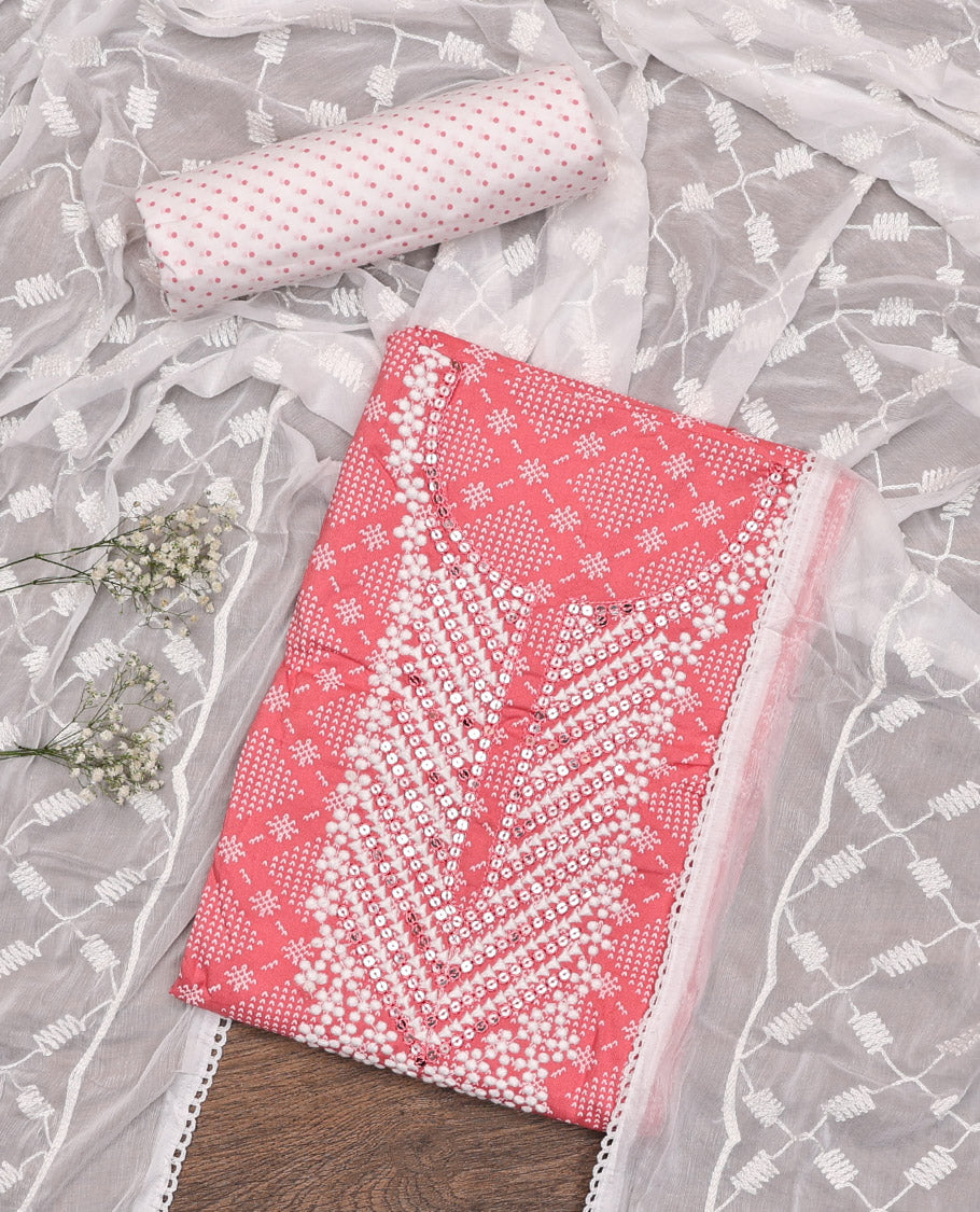 Pink Material Chudidar Set, Adorned with Jaal-Pattern Print and Neck Embroidery on Rayon Top, a Contrast Polka Dot Printed Bottom, and Paired with Embroidered Chiffon Dupatta