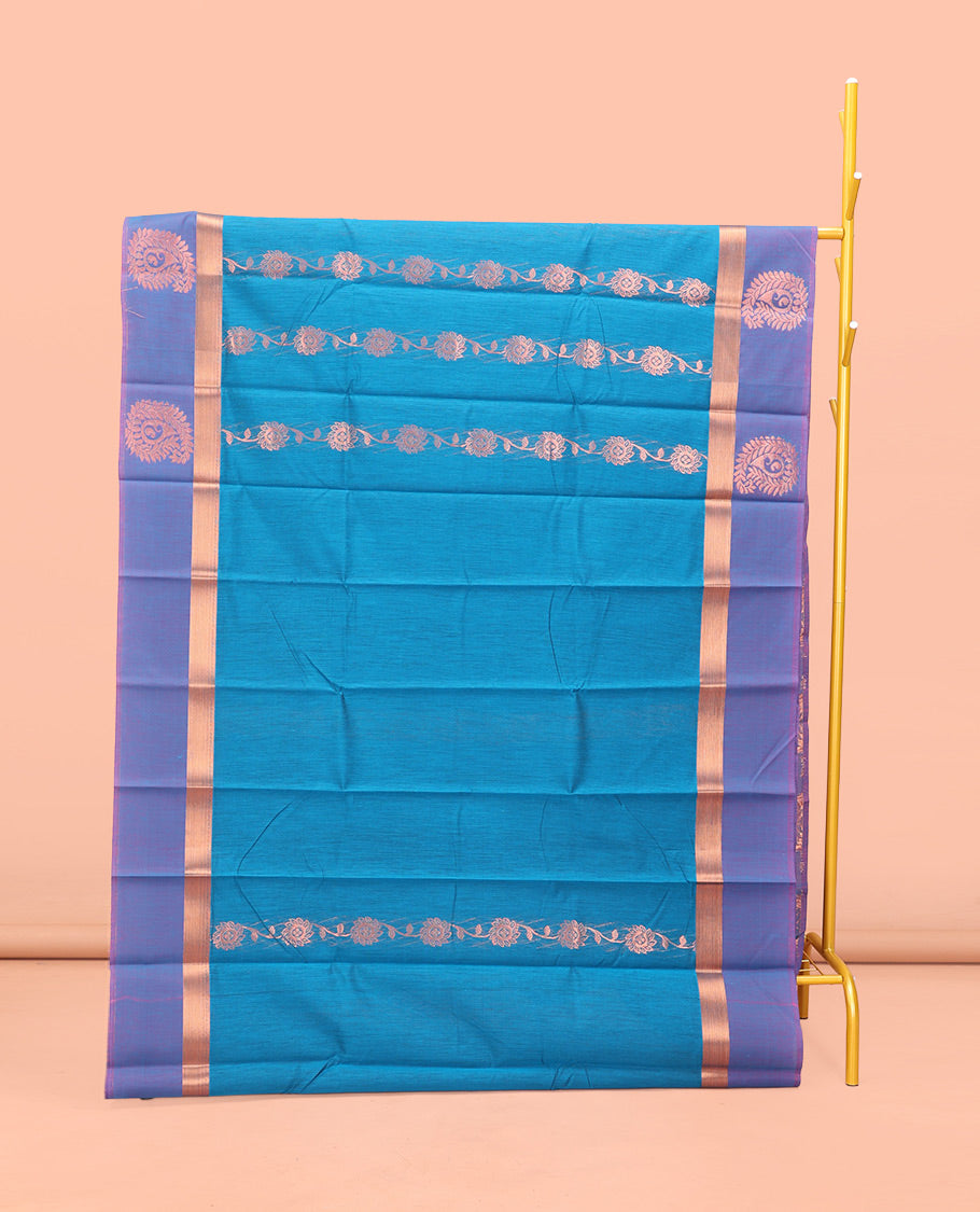 Blue Semi-Silk Cotton Saree, Opulently Embellished with Floral Creeper Design All Over Its Body, Complemented by a Contrast Paisley Zari Design Border, Pallu of Paisley Design, and Paired with a Matching Blouse
