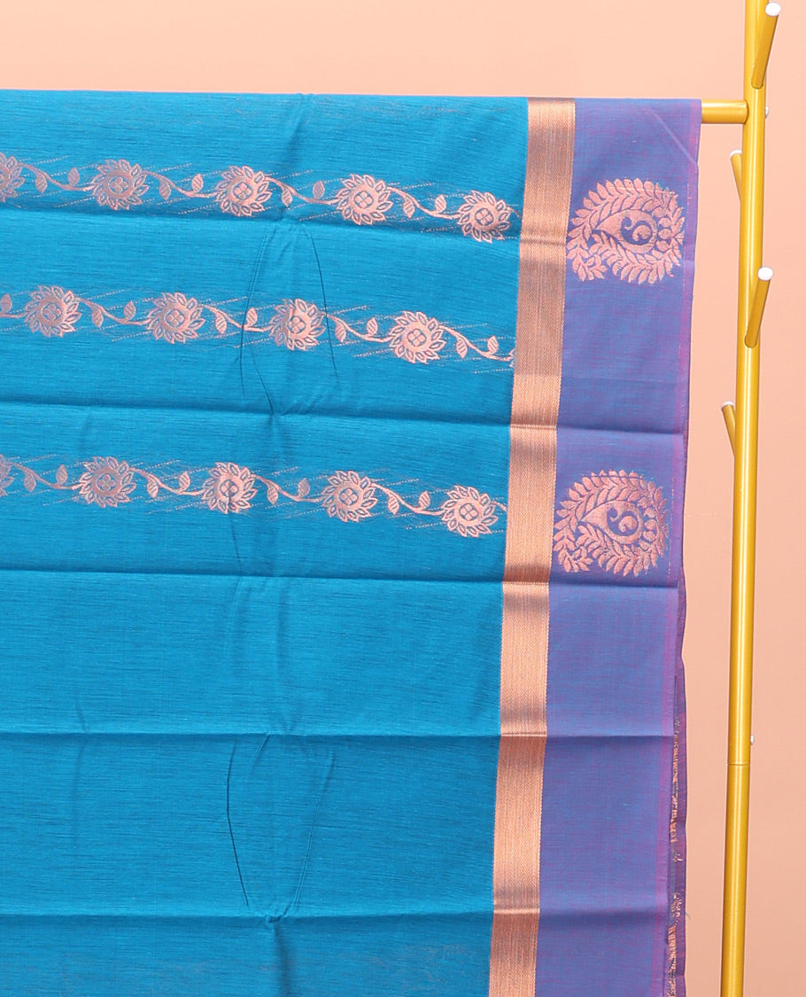 Blue Semi-Silk Cotton Saree, Opulently Embellished with Floral Creeper Design All Over Its Body, Complemented by a Contrast Paisley Zari Design Border, Pallu of Paisley Design, and Paired with a Matching Blouse