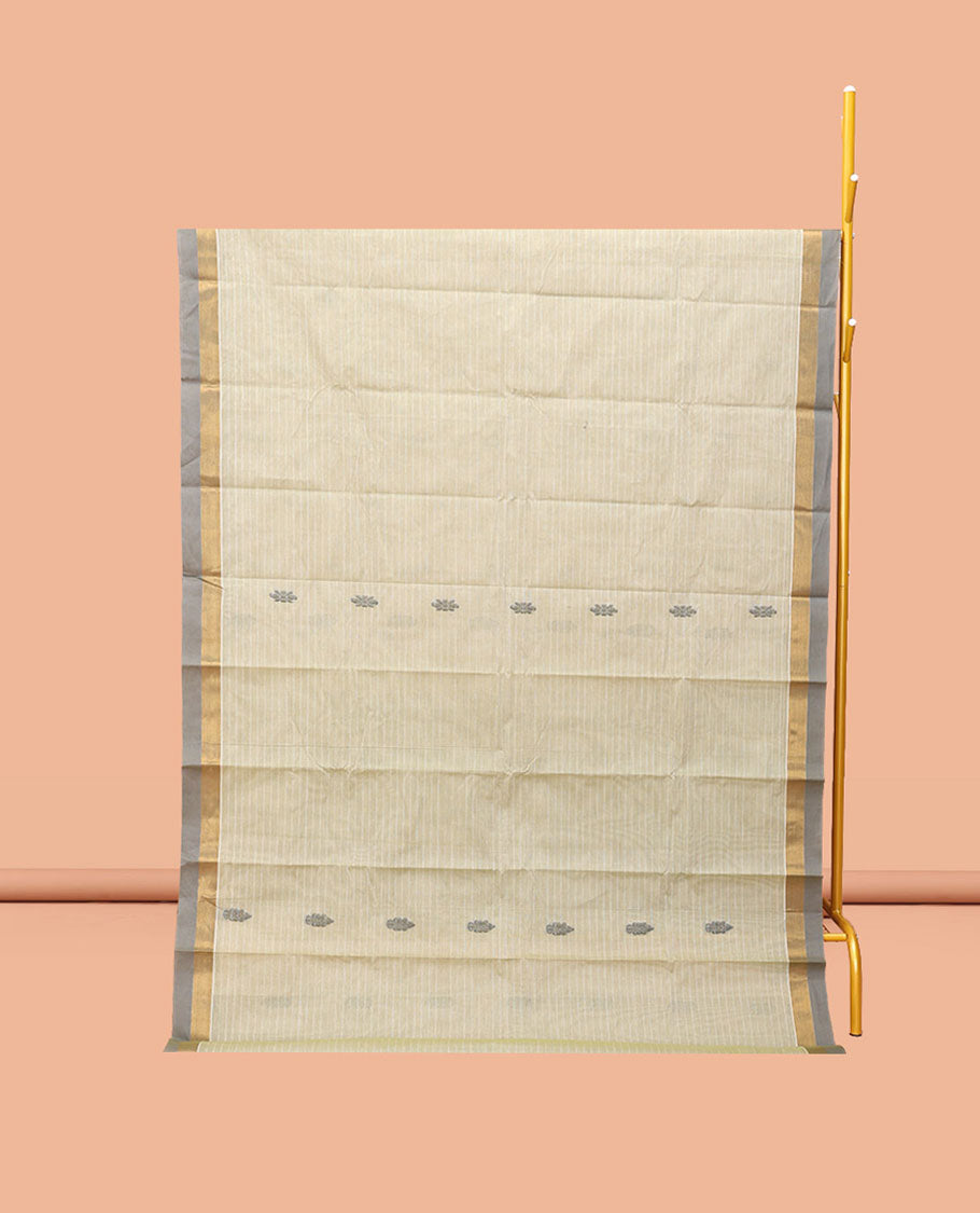 Off-White Kanchi Cotton Saree, Accentuated with Buttas, Complemented by a Contrast Border, Ogee Patterned Pallu, and a Matching Blouse