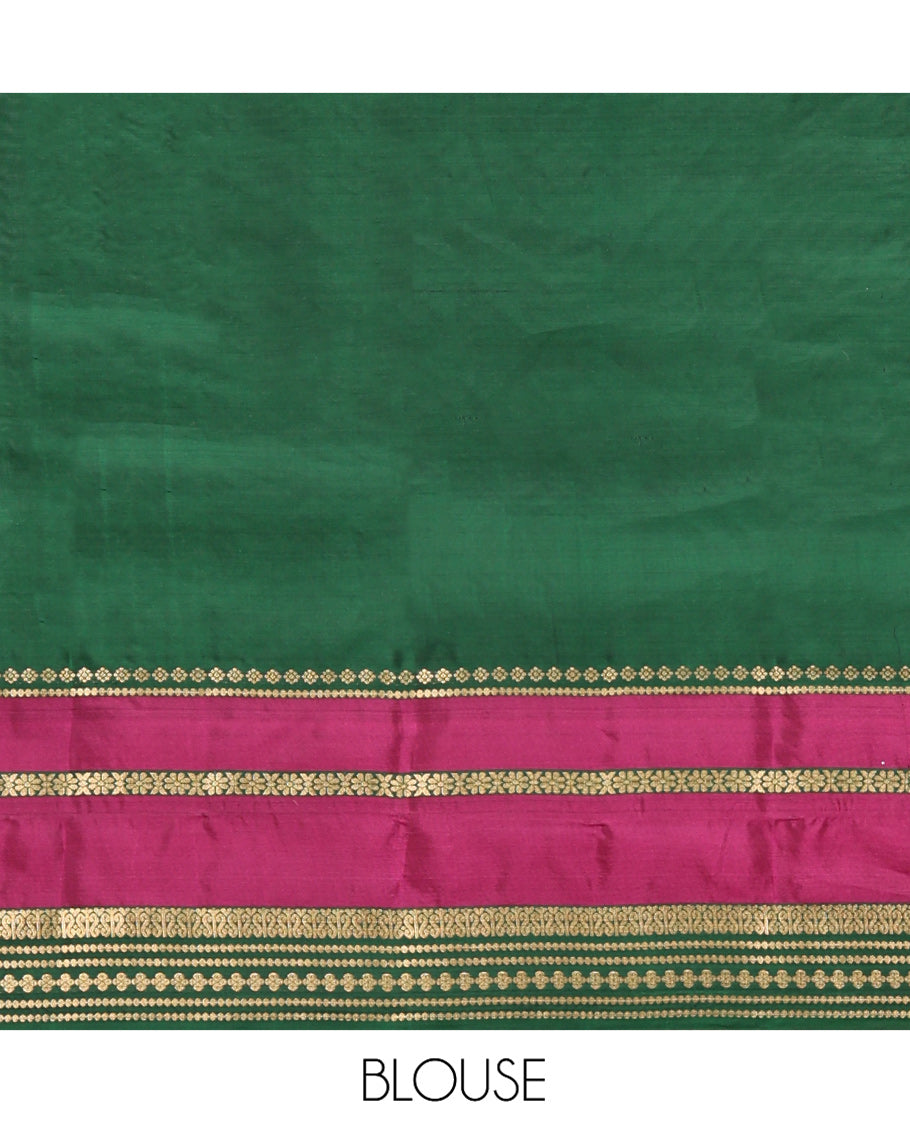 Maroon Vasundhara Lite Silk Mix Saree, Decked Up with Zari Buttas All Over Its Body, Complemented by Contrast Varisai Pettu Zari Border, Grandly Decked Up Pallu, and Paired with a Contrast Blouse