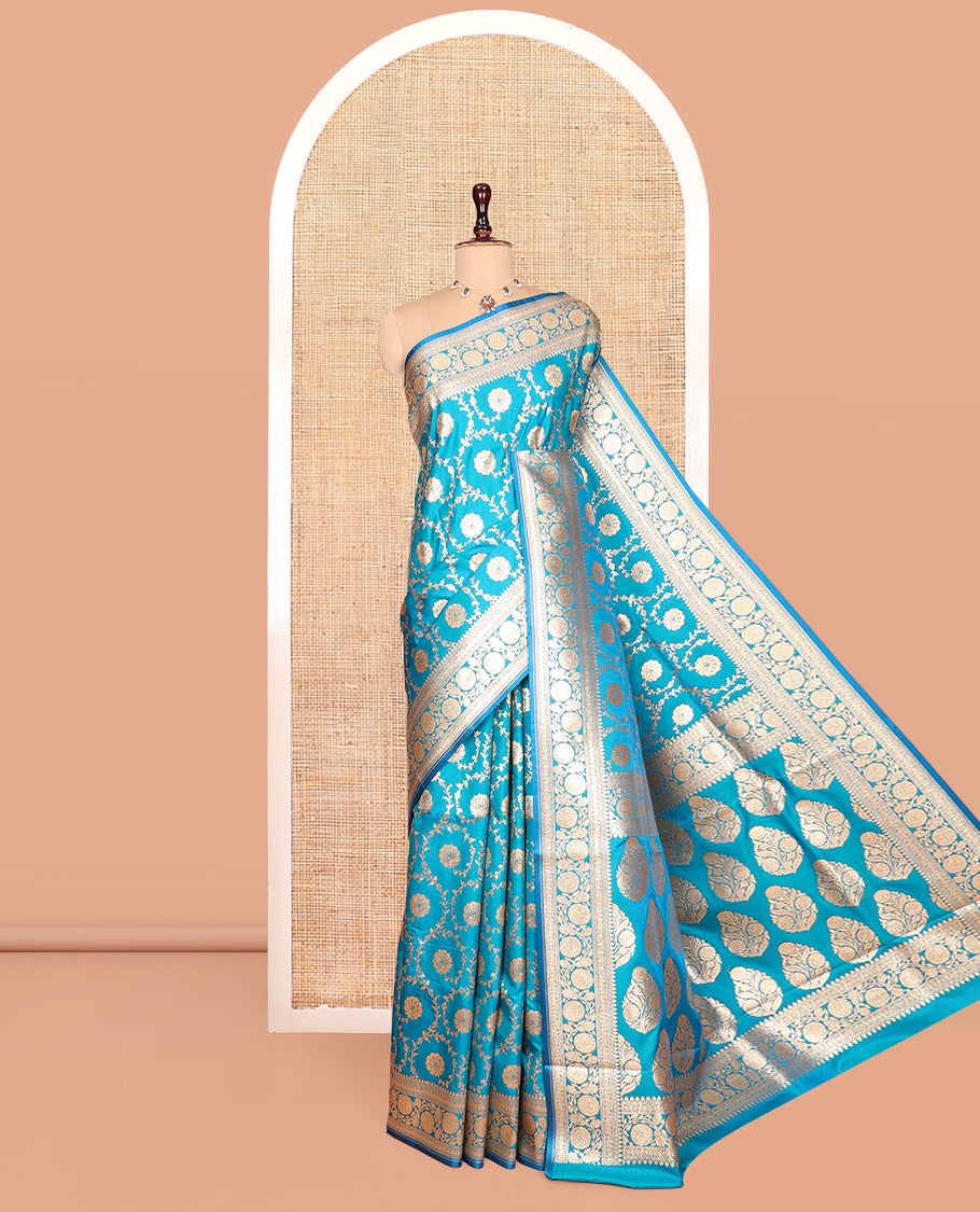 Blue Banarasi Nylon Saree, Highlighted by Floral Jacquard, Floral Creeper Zari Border, Intricate Pallu, and a Matching Blouse