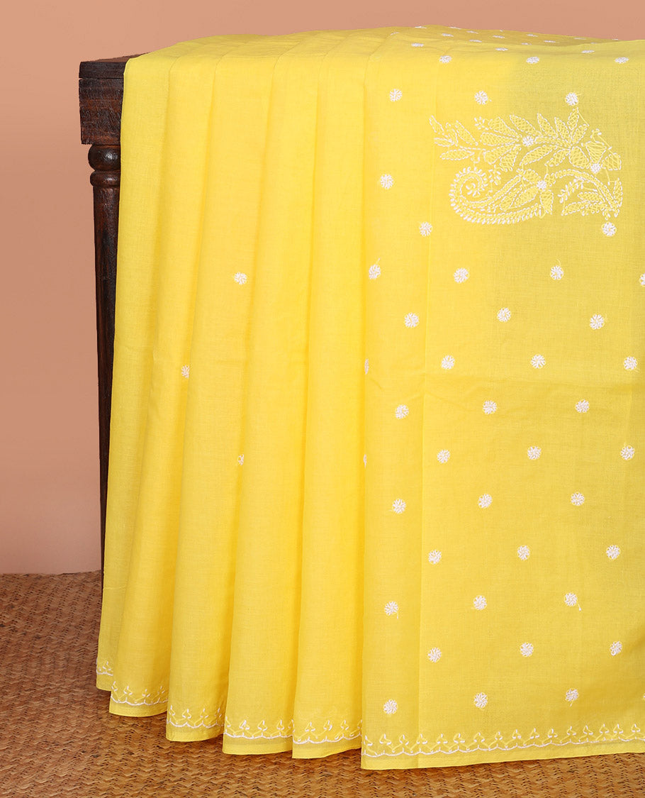 Yellow Lucknowi Chikankari Cotton Saree, Elegantly Woven with Floral Motifs Embroidery on Its Body, Subtle Embroidery Border, Pallu of Paisley Embroidery, and Comes Without a Blouse
