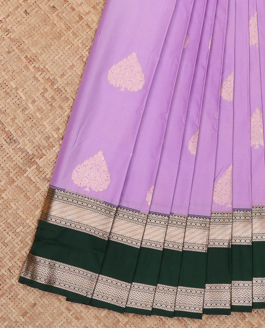 Lavender Budget Silk Saree, Sparsely Threaded with Zari Buttas, Complemented by a Contrast Traditional Zari Rettai Pettu Border, Grand Pallu, and a Contrast Blouse