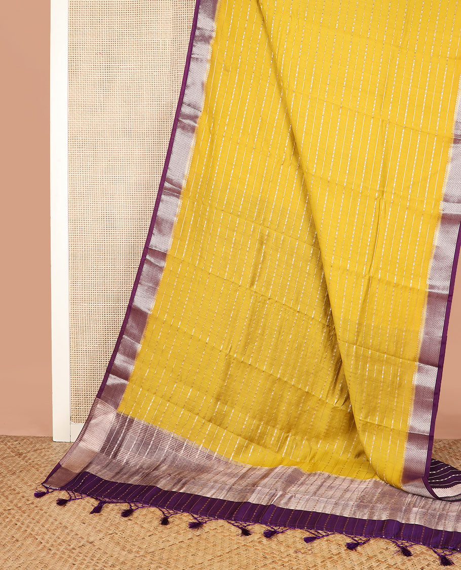 Yellow zari striped assam silk saree, contrast traditional zari border, and zari striped pallu