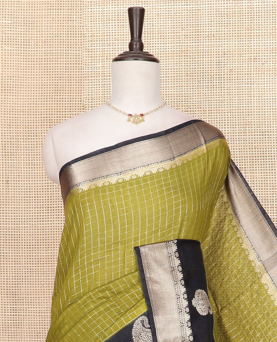 Green zari checked Assam silk saree, contrast traditional zari border of paisleys, and pallu of zari stripes