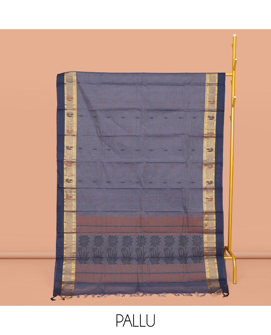Grey Kanchi Cotton Saree, Adorned with Buttas All Over Its Body, Complemented by a Contrast Border, Pallu of Floral Designs, and Paired with a Matching Blouse