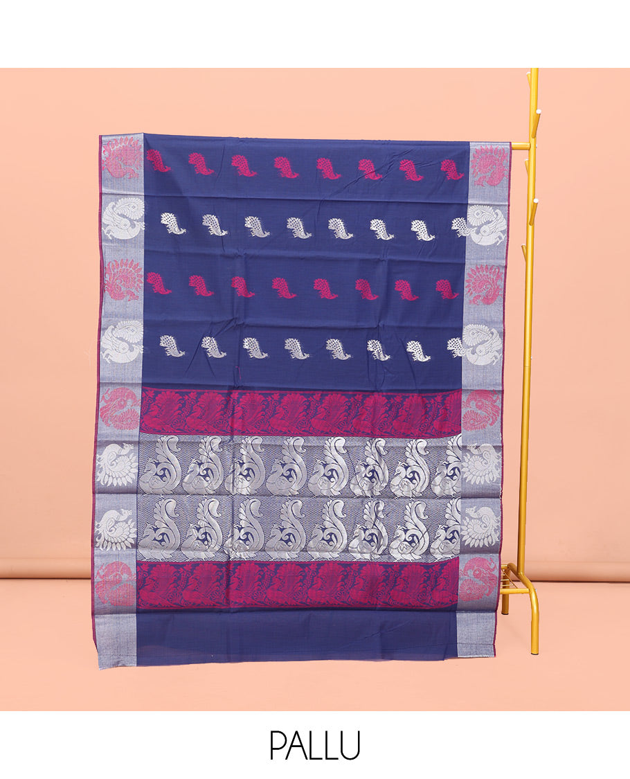 Navy Blue Semi-Silk Cotton Saree, Beautifully Detailed with Peacock Buttas on Its Body, Highlighted by Peacock Border, Pallu Steeped with Peacock Designs, and Paired with a Matching Blouse