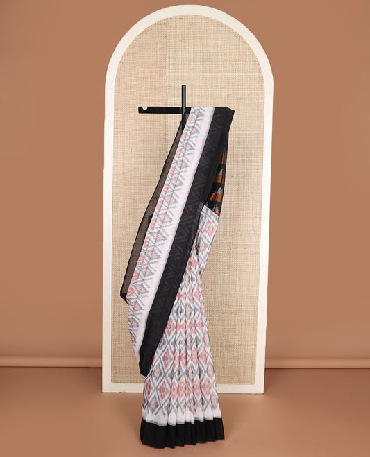 White jaal-patterned Pochampally cotton saree, contrast border & pallu of ikkat triangles
