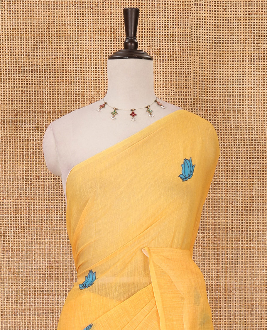 Borderless yellow pichwai lotus printed linen saree, contrast kalamkari floral vine printed pallu & contrast kalamkari floral vine printed blouse