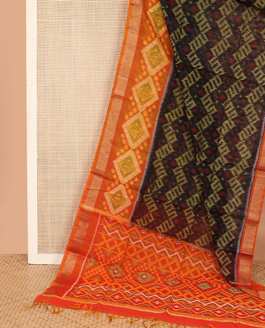 Black ikkat chevron design silk cotton saree, contrast diamond ikkat patterned border, and pallu of ikkat designs