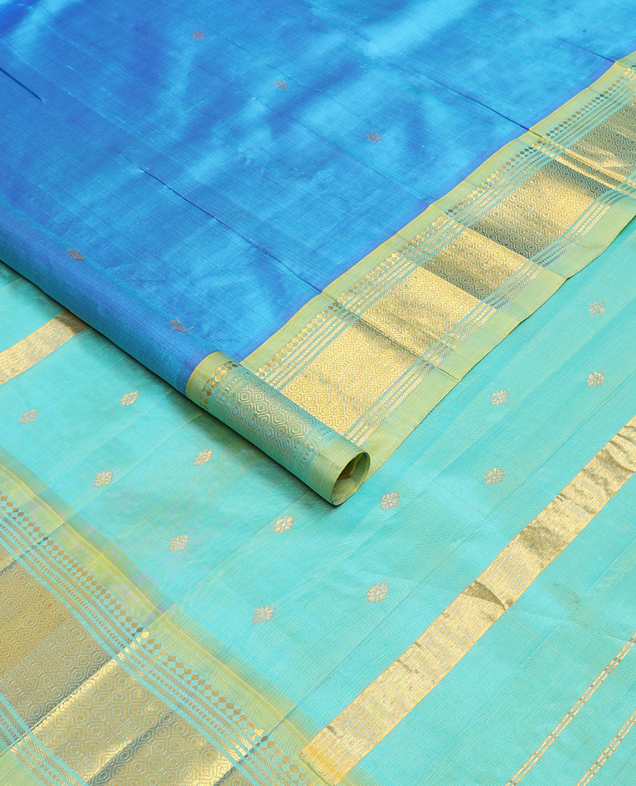 Blue zari buttas Kanchipuram silksaree, contrast one-sided border of panner sombu,banaras,muthu & then kuli kann & zari design pallu