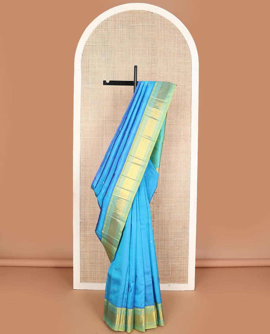 Blue zari buttas Kanchipuram silksaree, contrast one-sided border of panner sombu,banaras,muthu & then kuli kann & zari design pallu