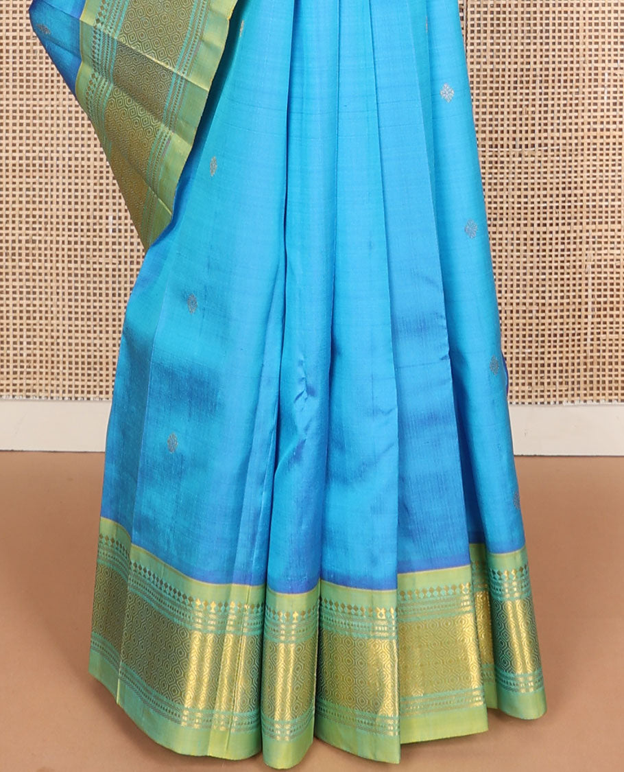 Blue zari buttas Kanchipuram silksaree, contrast one-sided border of panner sombu,banaras,muthu & then kuli kann & zari design pallu