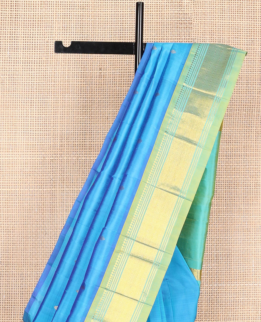 Blue zari buttas Kanchipuram silksaree, contrast one-sided border of panner sombu,banaras,muthu & then kuli kann & zari design pallu