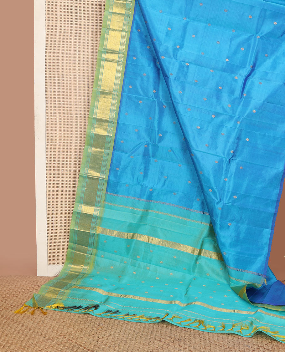 Blue zari buttas Kanchipuram silksaree, contrast one-sided border of panner sombu,banaras,muthu & then kuli kann & zari design pallu