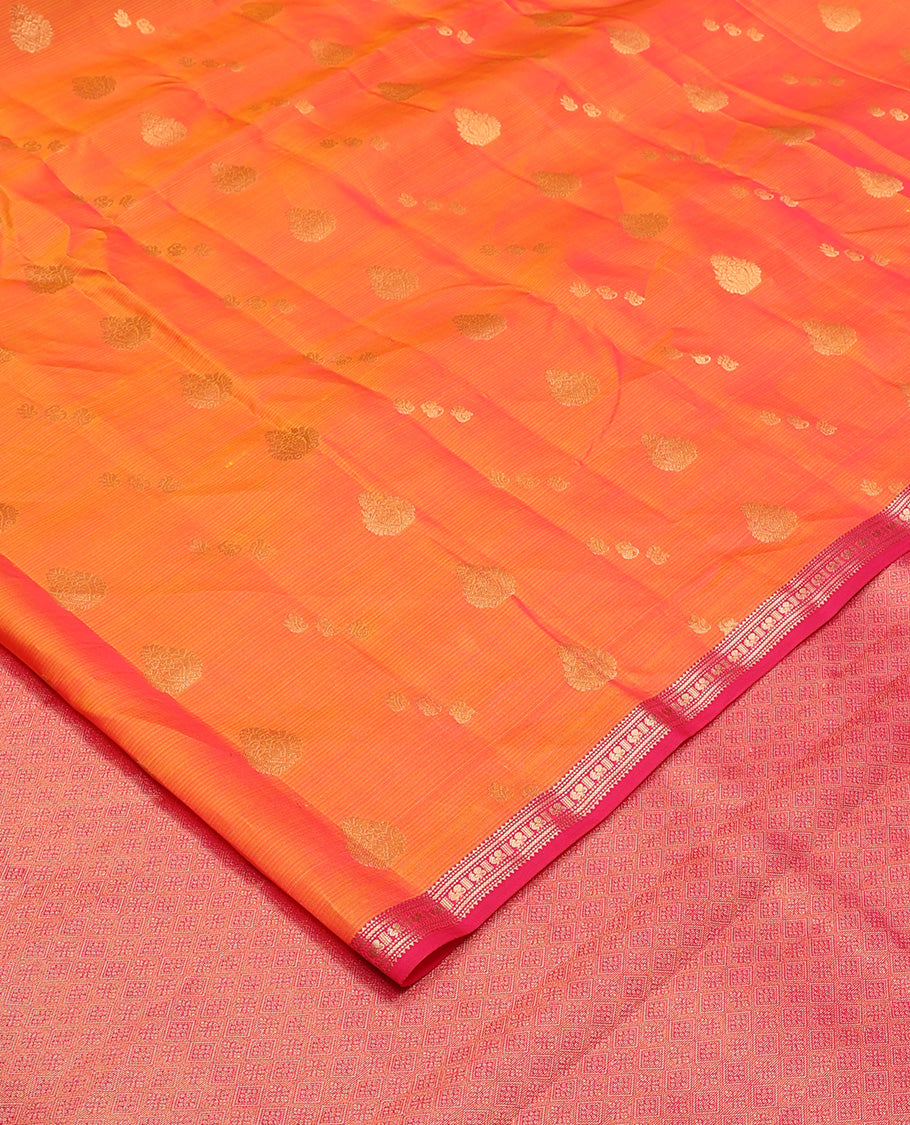 Orange stripes, and zari buttas Vasundhara silk mix saree, contrast border of rekku, kathir, and mayil designa, and zari-rich jaal pallu